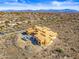 Aerial view of a house under construction, set in a scenic desert community with mountain views at 15728 N Mountain Pkwy, Fountain Hills, AZ 85268