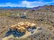 Aerial view of a new construction home with mountain views and surrounding desert landscape at 15728 N Mountain Pkwy, Fountain Hills, AZ 85268