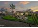 Spacious backyard with putting green and patio area at 15996 W Mesquite Ct, Surprise, AZ 85374