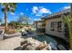 Backyard oasis with putting green and spa at 15996 W Mesquite Ct, Surprise, AZ 85374