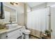 Clean bathroom with white vanity, toilet and shower at 15996 W Mesquite Ct, Surprise, AZ 85374