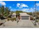 Single-story home with a tile roof and desert landscaping at 15996 W Mesquite Ct, Surprise, AZ 85374