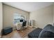 Home office features a large window, desk and comfortable seating at 15996 W Mesquite Ct, Surprise, AZ 85374