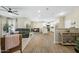 Open concept living room, kitchen, and dining area at 15996 W Mesquite Ct, Surprise, AZ 85374
