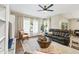 Relaxing living room with comfortable seating and large windows at 15996 W Mesquite Ct, Surprise, AZ 85374