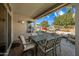 Covered patio with seating area and view of backyard at 15996 W Mesquite Ct, Surprise, AZ 85374