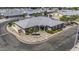 Aerial view of clubhouse featuring manicured landscaping, and ample parking at 2929 E Broadway Rd # 44, Mesa, AZ 85204