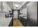 Charming kitchen features sleek countertops, stainless steel appliances, and subway tile backsplash at 2929 E Broadway Rd # 44, Mesa, AZ 85204