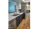 Modern kitchen with stainless steel appliances and white cabinets at 2929 E Broadway Rd # 44, Mesa, AZ 85204