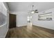 Spacious living room offering lots of natural light and wood-look floors, creating a welcoming atmosphere at 2929 E Broadway Rd # 44, Mesa, AZ 85204