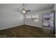 This bright room features wood-look flooring and a ceiling fan for comfort and style at 2929 E Broadway Rd # 44, Mesa, AZ 85204