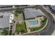 Aerial view showcases a pool, spa, shuffleboard, and landscaping, perfect for relaxation at 2929 E Broadway Rd # 44, Mesa, AZ 85204