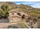 Two-story house with tile roof, desert landscaping, and mountain views at 36039 N 58Th St, Cave Creek, AZ 85331