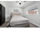 Bedroom featuring neutral colors, a ceiling fan, a large window, and plenty of natural light at 36039 N 58Th St, Cave Creek, AZ 85331