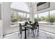 Breakfast nook with views of pool, modern lighting, and seating for four at 36039 N 58Th St, Cave Creek, AZ 85331