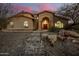 Stunning two-story home with a charming facade and stone pathway at 36039 N 58Th St, Cave Creek, AZ 85331