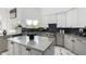Kitchen boasts gray countertops, stainless appliances, and modern cabinetry in an open layout at 36039 N 58Th St, Cave Creek, AZ 85331