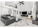 Large living room with marble floors, high ceilings, comfortable furniture and television at 36039 N 58Th St, Cave Creek, AZ 85331