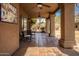 Covered patio with tiled floor and seating area at 36039 N 58Th St, Cave Creek, AZ 85331