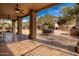 Covered patio with ceiling fans and seating area at 36039 N 58Th St, Cave Creek, AZ 85331
