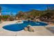 Inviting freeform pool with rock waterfall and expansive views at 36039 N 58Th St, Cave Creek, AZ 85331