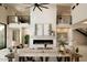 Spacious living room with a double-sided fireplace and high ceilings at 36420 N 105Th Pl, Scottsdale, AZ 85262