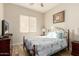 Charming bedroom with wood flooring and a comfortable bed at 4350 S Hudson Pl, Chandler, AZ 85249