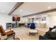 Finished basement with comfortable seating and game area at 4401 E Sunset Dr, Phoenix, AZ 85028
