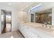 Elegant bathroom with double vanity, large mirror, and walk-in shower at 4401 E Sunset Dr, Phoenix, AZ 85028