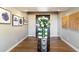 Bright entryway with glass table and art at 4401 E Sunset Dr, Phoenix, AZ 85028