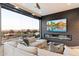 Living room boasts stunning mountain views, a fireplace, and ample seating at 4401 E Sunset Dr, Phoenix, AZ 85028