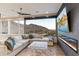 Relaxing living room with mountain views, fireplace, and comfortable seating at 4401 E Sunset Dr, Phoenix, AZ 85028