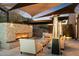 Outdoor patio with fireplace, seating area, and heaters at 4401 E Sunset Dr, Phoenix, AZ 85028