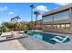 Luxury pool with spacious patio, fire pit, and mountain views at 4401 E Sunset Dr, Phoenix, AZ 85028