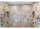 Spa-like shower with herringbone patterned tile at 4401 E Sunset Dr, Phoenix, AZ 85028