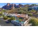Aerial view showcasing home, pool, and mountain backdrop at 4601 E Solano Dr, Phoenix, AZ 85018