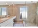 Clean bathroom with single vanity and walk-in shower at 4601 E Solano Dr, Phoenix, AZ 85018