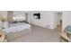 Spacious bedroom with plush carpeting and ensuite bathroom access at 4601 E Solano Dr, Phoenix, AZ 85018