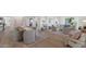 Open concept dining room with modern table and chairs at 4601 E Solano Dr, Phoenix, AZ 85018