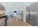 Bright kitchen with stainless steel appliances and white cabinetry at 4601 E Solano Dr, Phoenix, AZ 85018