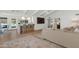 Open kitchen with breakfast bar and view to backyard at 4601 E Solano Dr, Phoenix, AZ 85018