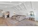Spacious living room with vaulted ceilings and sectional sofa at 4601 E Solano Dr, Phoenix, AZ 85018