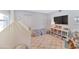 Playroom featuring two armchairs, a play tent, and a bookcase at 4601 E Solano Dr, Phoenix, AZ 85018