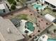 Aerial view of a house with a pool and landscaped backyard at 4966 E Juana Ct, Cave Creek, AZ 85331