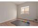 Spacious bedroom with wood floors and window, great for exercise at 4966 E Juana Ct, Cave Creek, AZ 85331