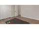 Well-lit bedroom with wood-look floors and a large closet at 4966 E Juana Ct, Cave Creek, AZ 85331