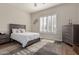 Guest bedroom with window shutters and dresser at 4966 E Juana Ct, Cave Creek, AZ 85331