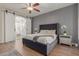 Bright bedroom with barn doors to ensuite bathroom at 4966 E Juana Ct, Cave Creek, AZ 85331