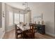 Bright dining room featuring a wood table and built-in cabinetry at 4966 E Juana Ct, Cave Creek, AZ 85331