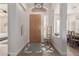 Bright and spacious entryway with wood floors and a decorative rug at 4966 E Juana Ct, Cave Creek, AZ 85331